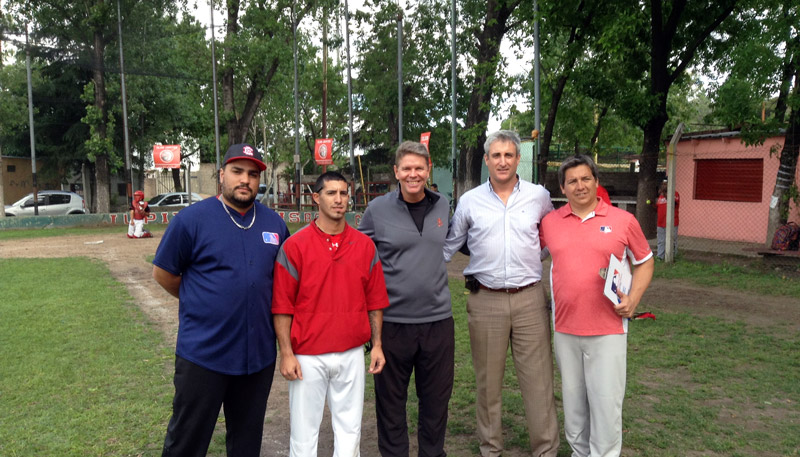 Joel Bradley with Argentina baseball coaches